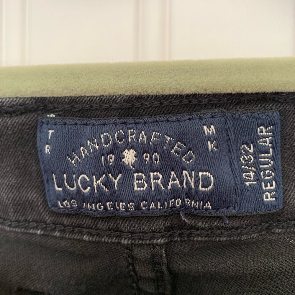 Weathered black denim jeans